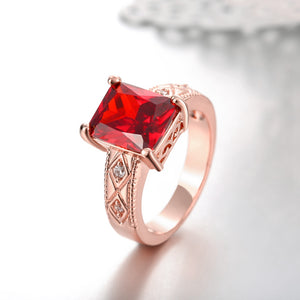Ruby Emerald Cut Center Halo Ring in 18K Rose Gold