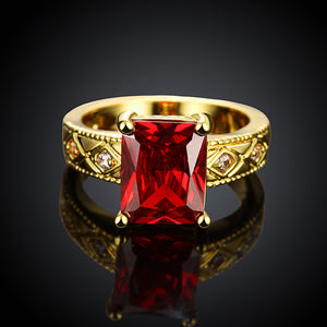 Ruby Emerald Cut Center Halo Ring in 14K Gold