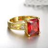 Ruby Emerald Cut Center Halo Ring in 14K Gold