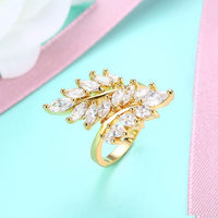 Swarovski Elements Multi Orchid Swirl Ring in Gold - Golden NYC Jewelry www.goldennycjewelry.com fashion jewelry for women