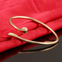 Drop Bangle in 14K Gold