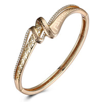 Swarovski Crystal 18K Gold Plated Iception Twist Bangle - Golden NYC Jewelry