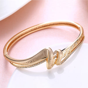 Austrian Crystal 18K Gold Plated Iception Twist Bangle - Golden NYC Jewelry