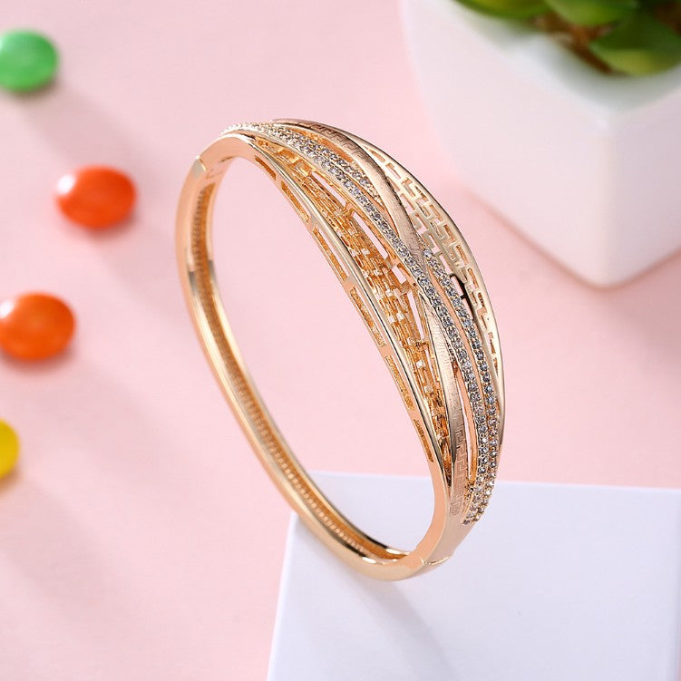 Swarovski Crystal 18K Gold Plated Crossroads Bangle - Golden NYC Jewelry