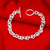 Infinity Swirl Bracelet in 18K White Gold Plated