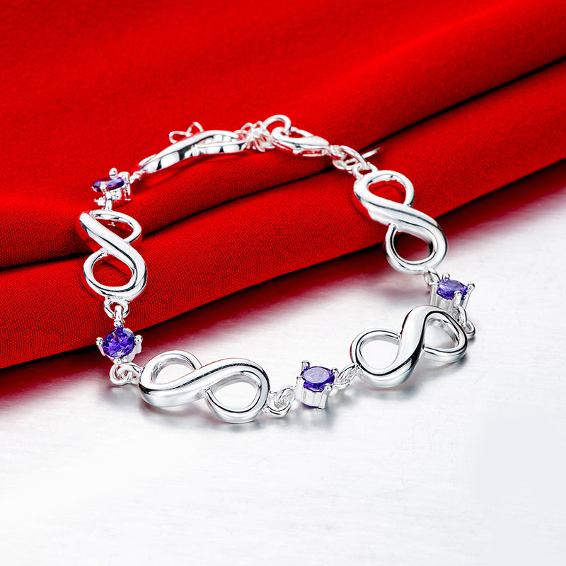 Purple Swarovski Infinite Shaped Bracelet in 18K White Gold