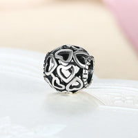 Sterling Silver Laser Cut Hollow Hearts Charm - Golden NYC Jewelry