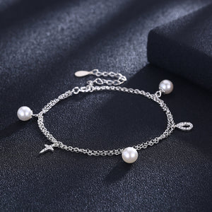 Sterling Silver Pearls and Cross Bracelet