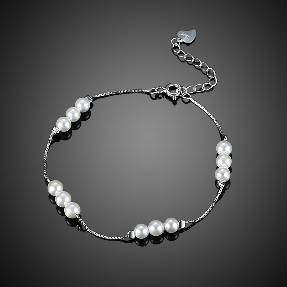 Sterling Silver Simulated Twelve Pearls Modern Bracelet - Golden NYC Jewelry www.goldennycjewelry.com fashion jewelry for women