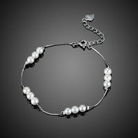 Sterling Silver Simulated Twelve Pearls Modern Bracelet - Golden NYC Jewelry www.goldennycjewelry.com fashion jewelry for women