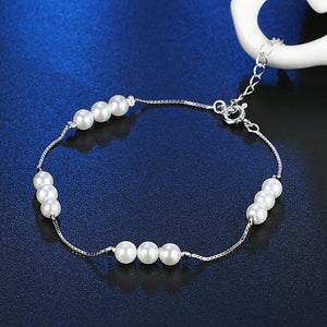 Sterling Silver Simulated Twelve Pearls Modern Bracelet - Golden NYC Jewelry www.goldennycjewelry.com fashion jewelry for women