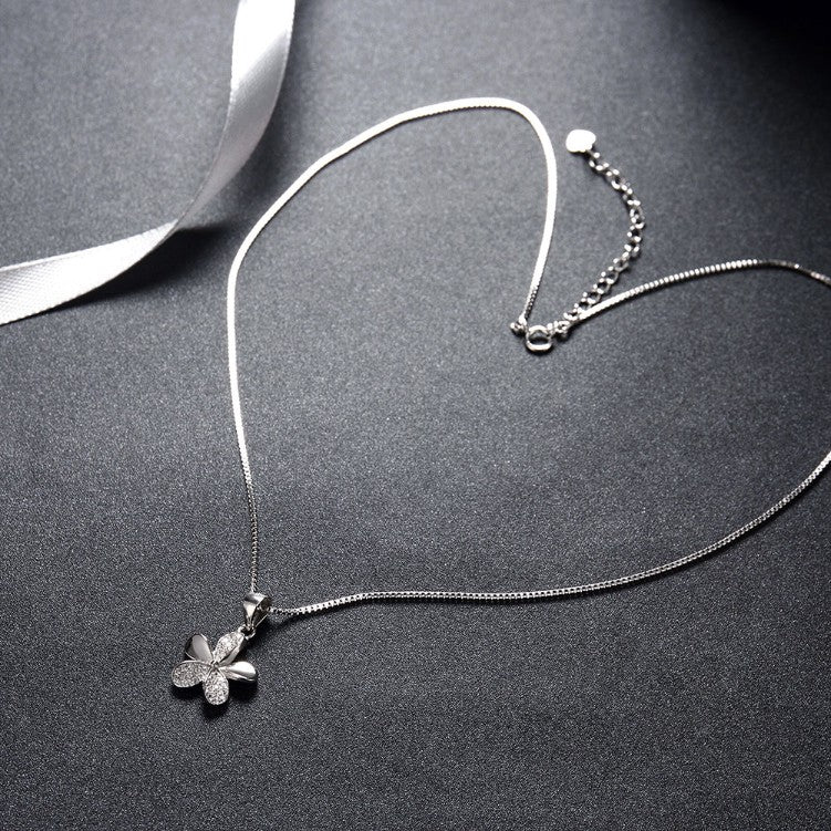 Sterling Silver Pa've Petals Pendant Necklace - Golden NYC Jewelry www.goldennycjewelry.com fashion jewelry for women